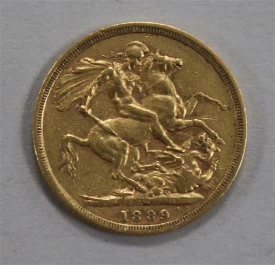An 1889 gold full sovereign.